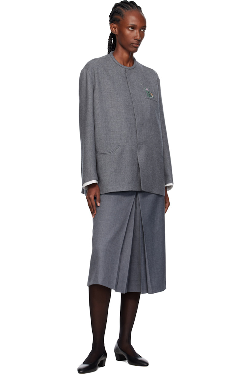 Wool-blend twill trousers.

· Four-pocket styling
· Zip fly
· Pleats at inseams
· Cropped legs

Supplier color: Grey