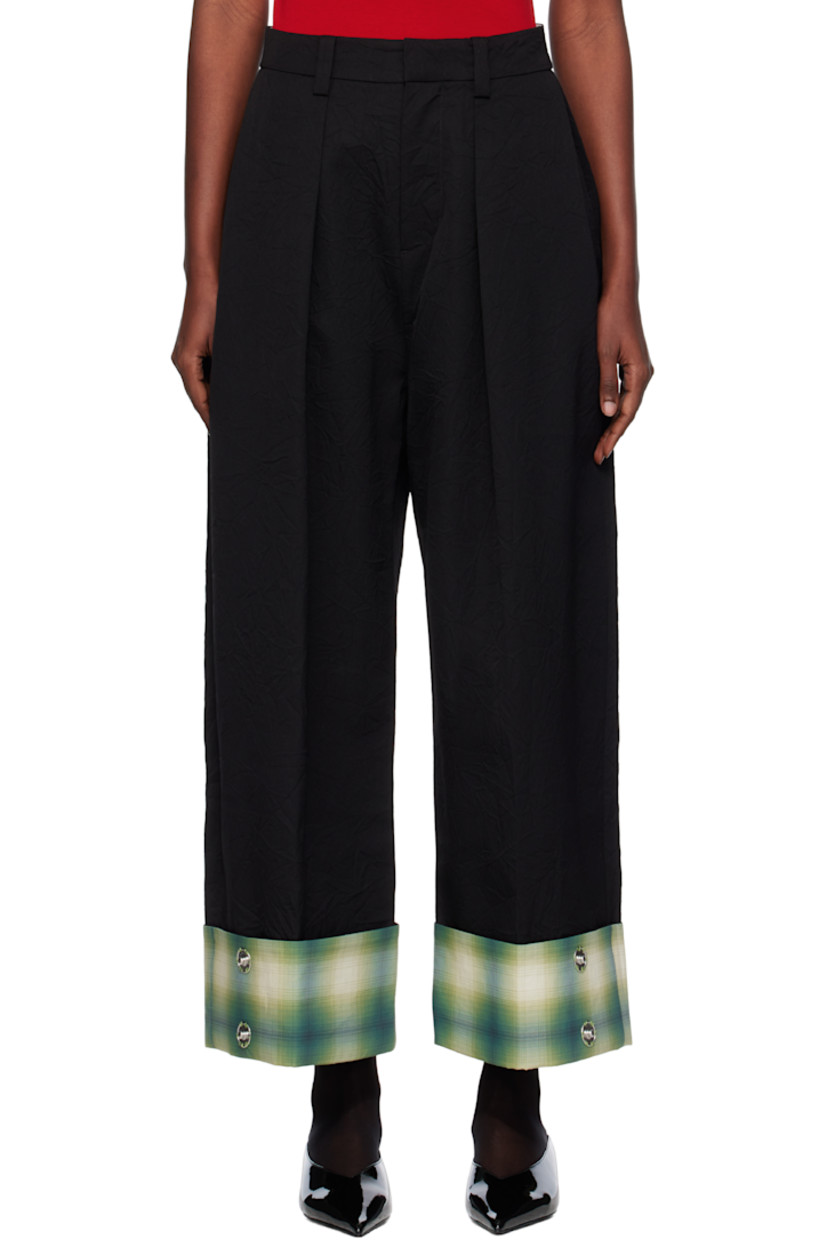 Crinkled wool twill trousers.

· Belt loops
· Two-pocket styling
· Zip fly
· Pleats at front
· Creased legs
· Press-stud fastenings and check pattern at rolled cuffs

Supplier color: Black