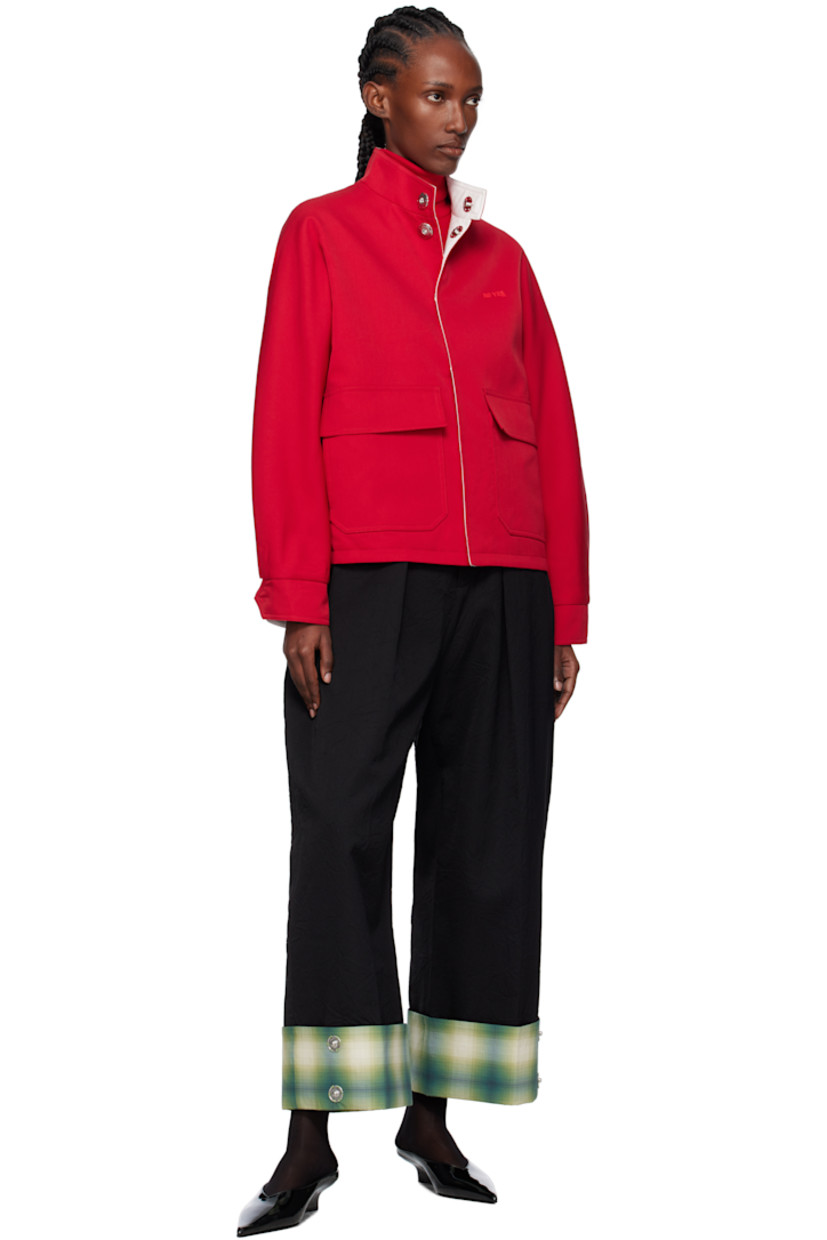 Crinkled wool twill trousers.

· Belt loops
· Two-pocket styling
· Zip fly
· Pleats at front
· Creased legs
· Press-stud fastenings and check pattern at rolled cuffs

Supplier color: Black