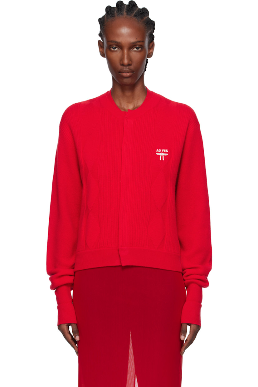 Rib-knit wool- and cashmere-blend cardigan.

· Layered crewneck
· Concealed press-stud closure
· Jacquard argyle pattern at front
· Logo embroidered at chest

Supplier color: Red