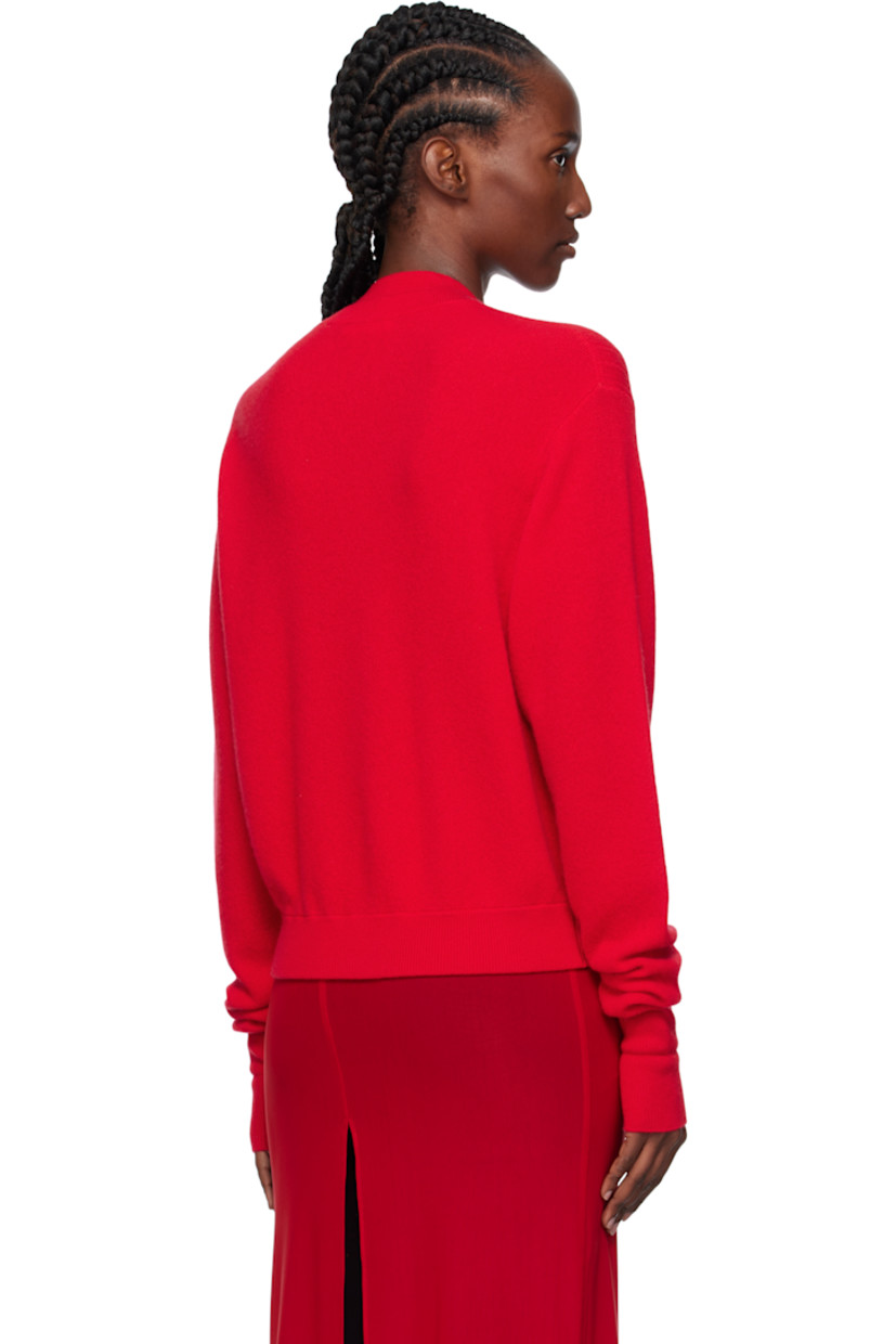 Rib-knit wool- and cashmere-blend cardigan.

· Layered crewneck
· Concealed press-stud closure
· Jacquard argyle pattern at front
· Logo embroidered at chest

Supplier color: Red