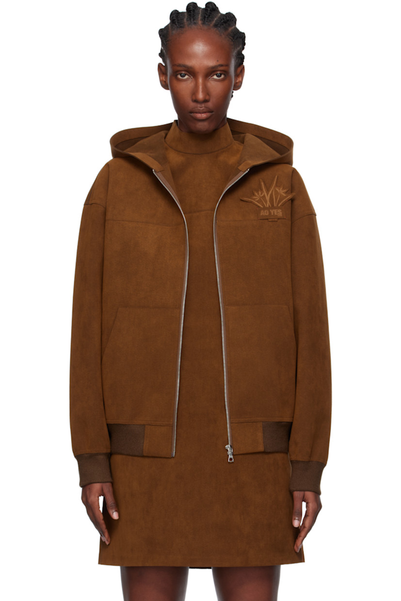 Faux-suede jacket.

· Zip closure
· Graphic and logo appliqué at chest
· Patch pockets at front and back
· Rib-knit hem and cuffs

Supplier color: Brown