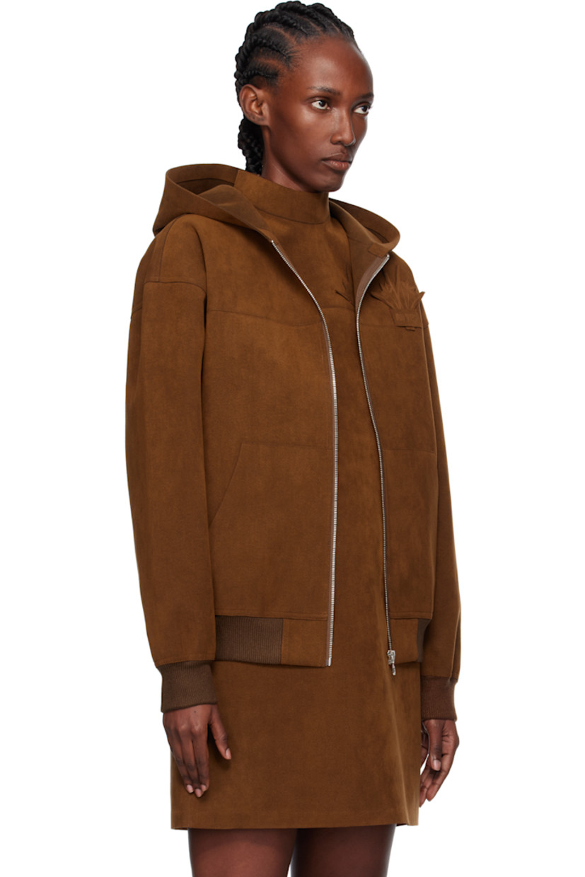 Faux-suede jacket.

· Zip closure
· Graphic and logo appliqué at chest
· Patch pockets at front and back
· Rib-knit hem and cuffs

Supplier color: Brown