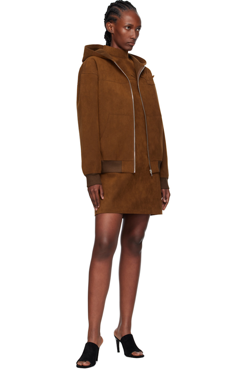 Faux-suede jacket.

· Zip closure
· Graphic and logo appliqué at chest
· Patch pockets at front and back
· Rib-knit hem and cuffs

Supplier color: Brown