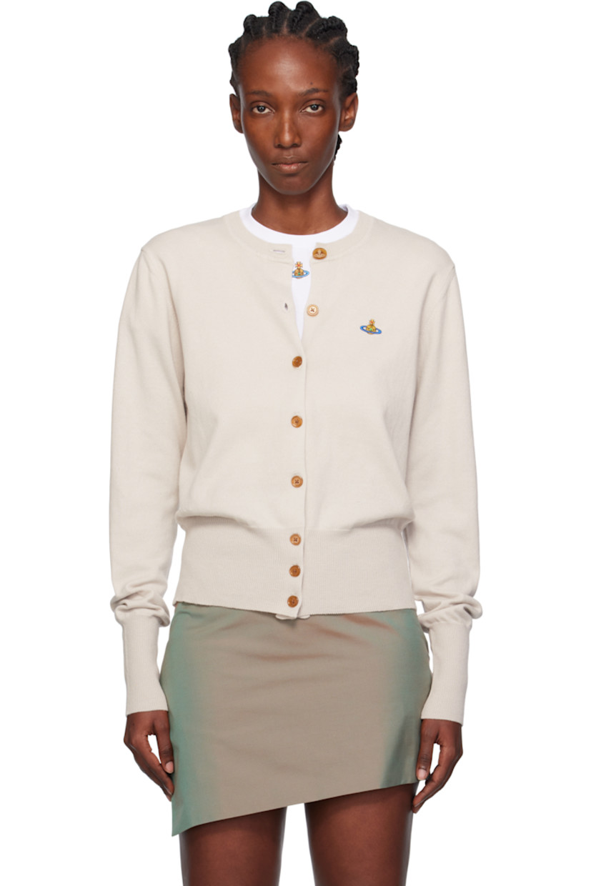 Knit organic cotton- and cashmere-blend cardigan.

· Rib-knit crewneck, hem, and cuffs
· Button closure
· Embroidered logo at chest

Supplier color: Dusty white