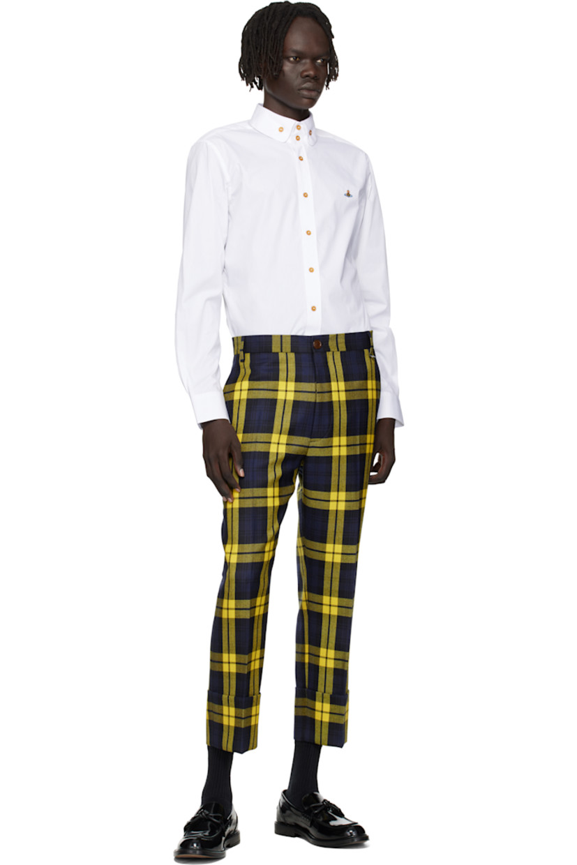 Regenerative cotton poplin shirt.

· Button-down spread collar
· Button closure
· Logo embroidered at chest
· Shirttail hem
· Pleats at single-button barrel cuffs
· Twin pleats at back yoke

Supplier color: White