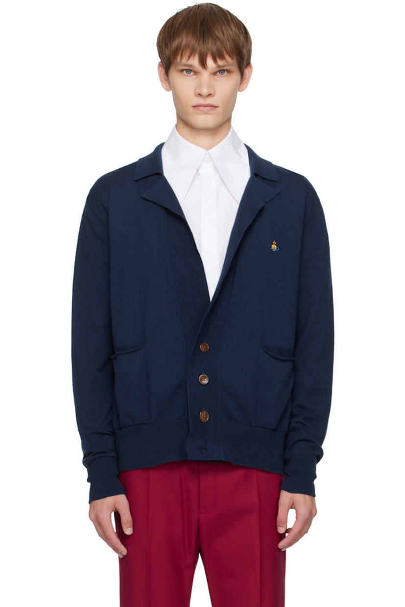 Knit organic cotton- and cashmere-blend cardigan.

· Rib-knit open spread collar, hem, and cuffs
· Button closure
· Logo embroidered at chest
· Welt pockets with rolled edge at front

Supplier color: Navy