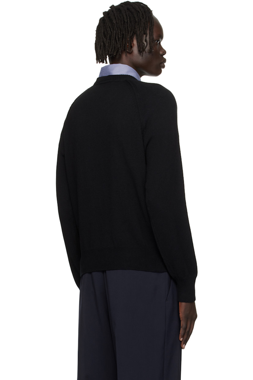 Knit organic cotton-blend sweater.

· Rib-knit crewneck, hem, and cuffs
· Logo and graphic embroidered at chest
· Raglan sleeves

Supplier color: Black