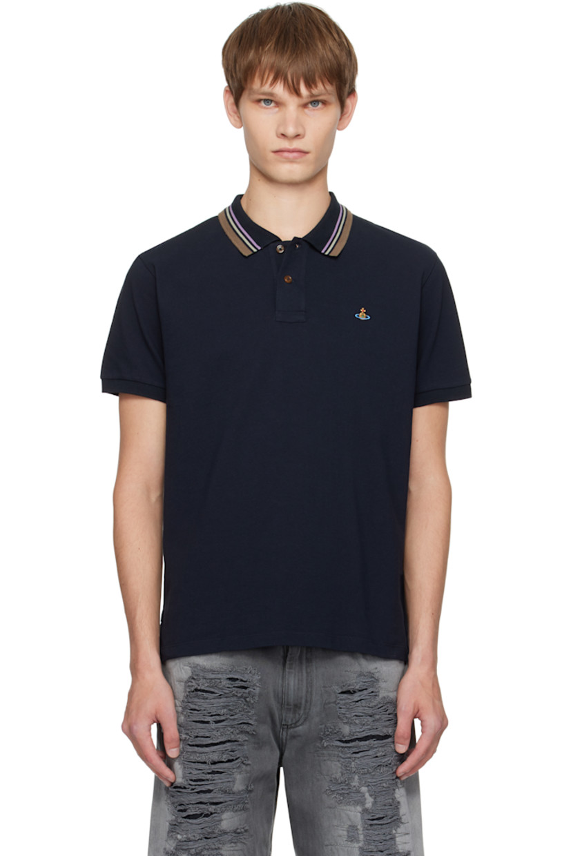 Organic cotton piqué polo.

· Stripes at spread collar
· Three-button placket
�· Logo embroidered at chest
· Tennis-tail hem
· Rib-knit cuffs

Supplier color: Navy