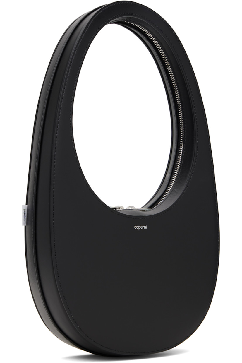 Buffed calfskin shoulder bag.

· Integrated shoulder strap
· Logo stamp at face
· Logo flag at side
· Two-way zip closure
· Logo-engraved silver-tone hardware
· H5.5" x W8.25" x D2.25"
· Total height: H14.75"

Supplier color: Black
