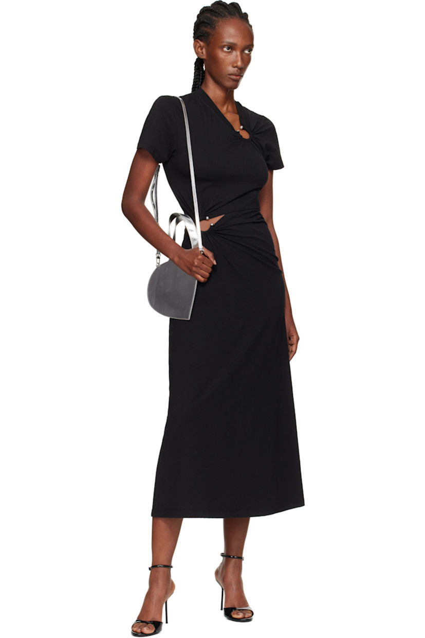 Heart-shaped crinkled patent leather shoulder bag.

· Twin carry handles
· Detachable and adjustable crossbody strap
· Logo stamp at face
· Buffed leather lining
· H6.25" x W8"
· Total height: H12"

Supplier color: Silver