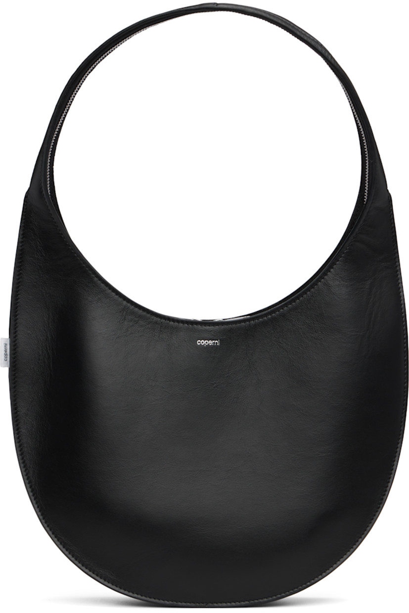Buffed leather shoulder bag.

· Logo stamp at face
· Logo flag at side
· Two-way zip closure extends to integrated shoulder strap
· Suede interior
· Silver-tone hardware
· H8" x W10.5" x D3.5"
· Total height: H17"

Supplier color: Black