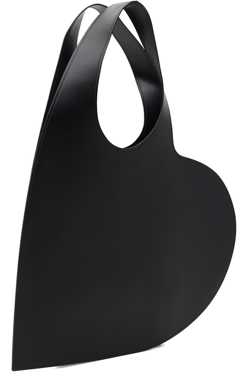 Heart-shaped buffed calfskin tote.

· Twin carry handles
· Logo stamp at face
· Buffed leather lining
· H13" x W17"
· Total height: H22"

Supplier color: Black