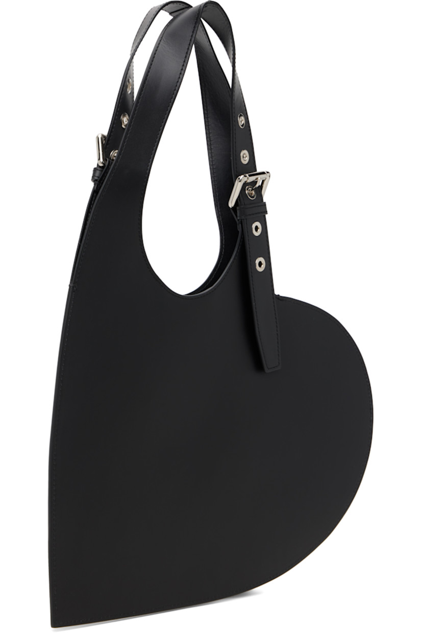 Heart-shaped buffed calfskin tote.

· Adjustable pin-buckle carry handles
· Logo stamp at face
· Buffed leather lining
· H9.75" x W13"
· Total height: H19"

Supplier color: Black