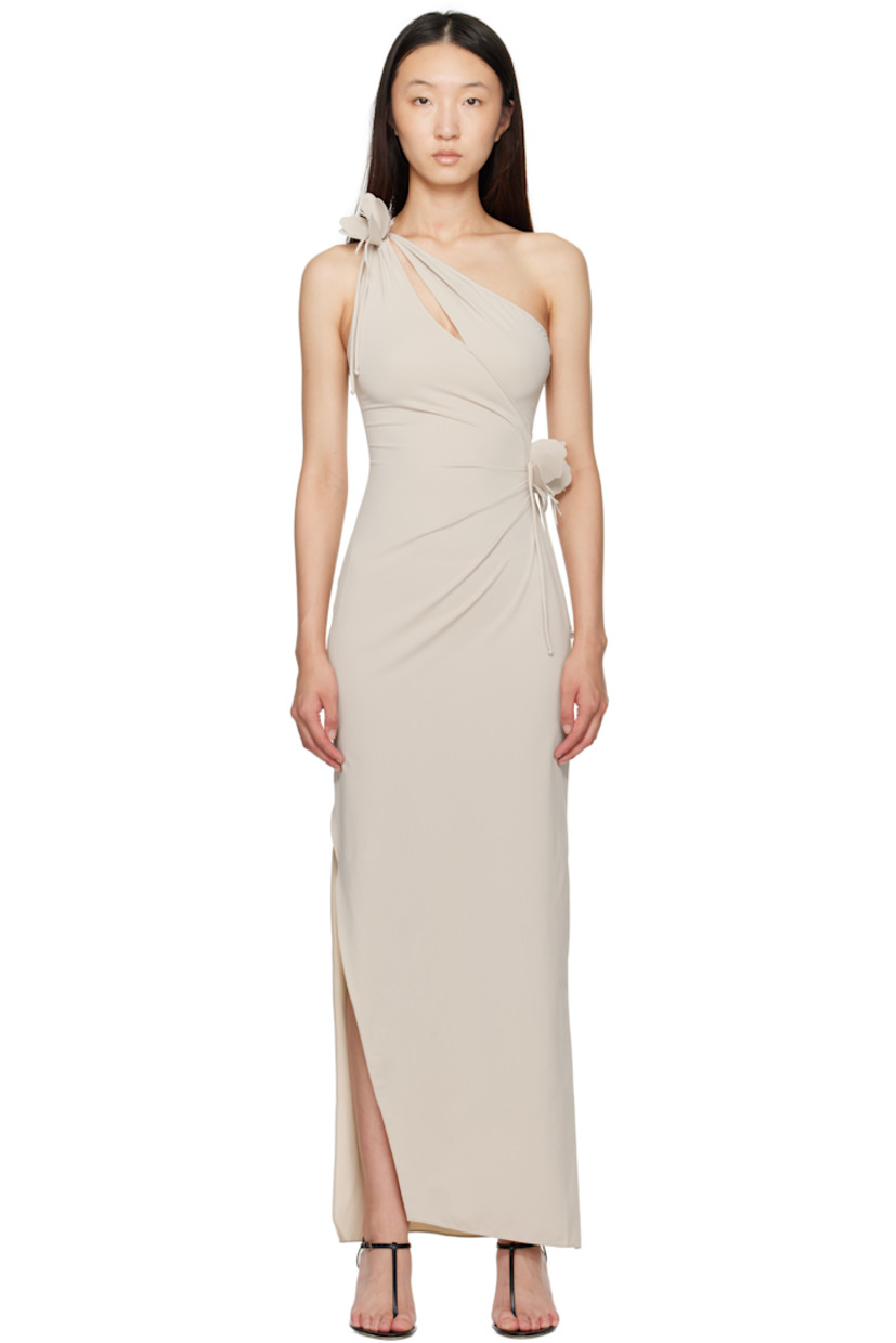 Stretch nylon jersey maxi dress. 

· Single-shoulder construction
· Asymmetrical neck and hem
· Cutout at chest
· Gathering at waist
· Floral appliqué at waist and shoulder
· Slit at side seam

Supplier color: Beige