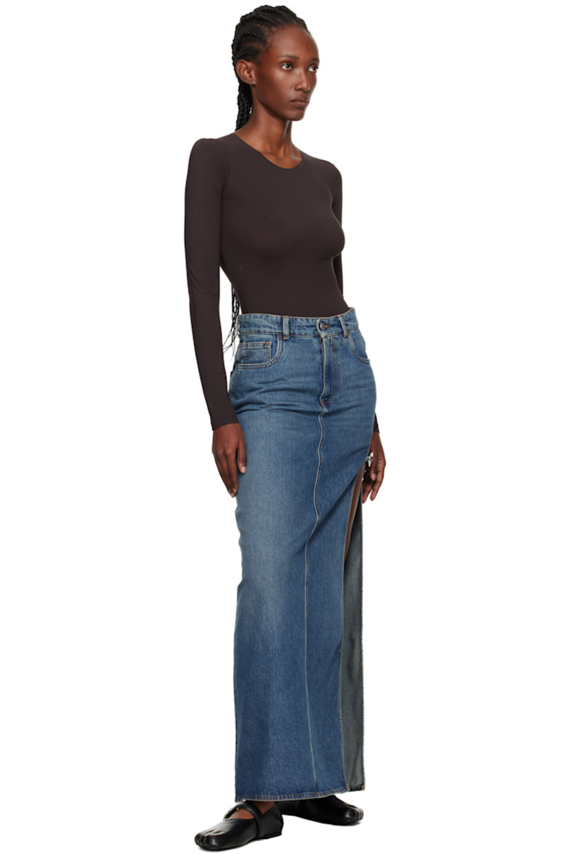 Non-stretch denim maxi skirt.

· Fading and whiskering throughout
· Belt loops
· Five-pocket styling
· Zip fly
· Slit and elasticized post-stud strap at side seam

Supplier color: Blue vintage