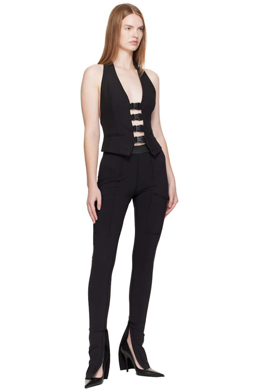 Recycled canvas waistcoat.

· Plunging neck
· Press-release fastenings at front
· Darts at chest
· Mock welt pockets
· Fixed press-release strap at low back
· Full satin lining

Supplier color: Black