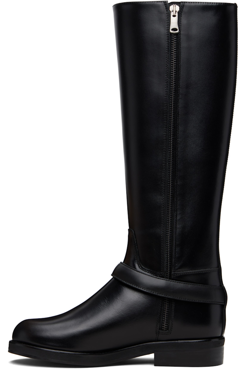 Knee-high buffed leather boots.

· Strap with logo hardware at vamp
· Zip closure at inner side
· Stacked leather block heel 
· Leather sole with rubber injections 

Supplier color: Black