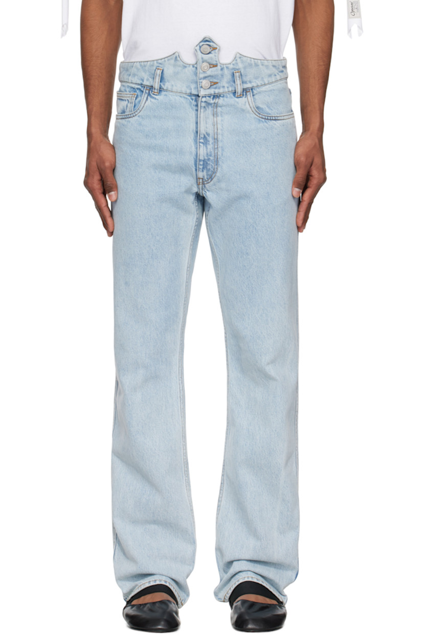 Non-stretch organic cotton denim jeans. Fading throughout.

· Belt loops and button fastening at modified waistband
· Five-pocket styling
· Zip fly
· Post-stud strap with logo hardware at back pocket
· Contrast stitching in tan

Part of the Disney capsule.

Supplier color: Blue bleached