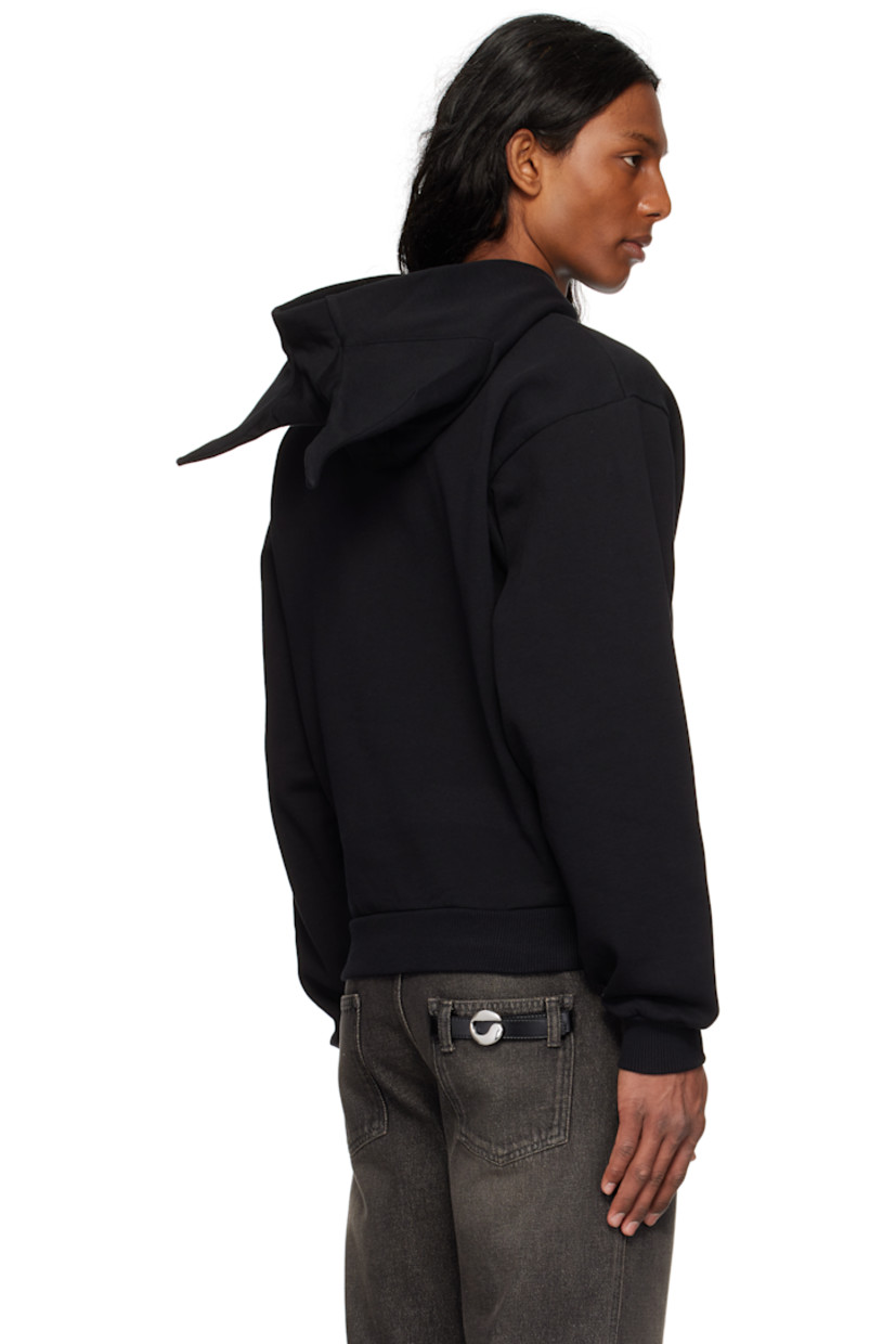 Organic cotton-blend fleece hoodie.

· Graphic appliqués at hood
· Logo printed at chest
· Rib-knit hem and cuffs
· Dropped shoulders

Part of the Disney capsule.

Supplier color: Black