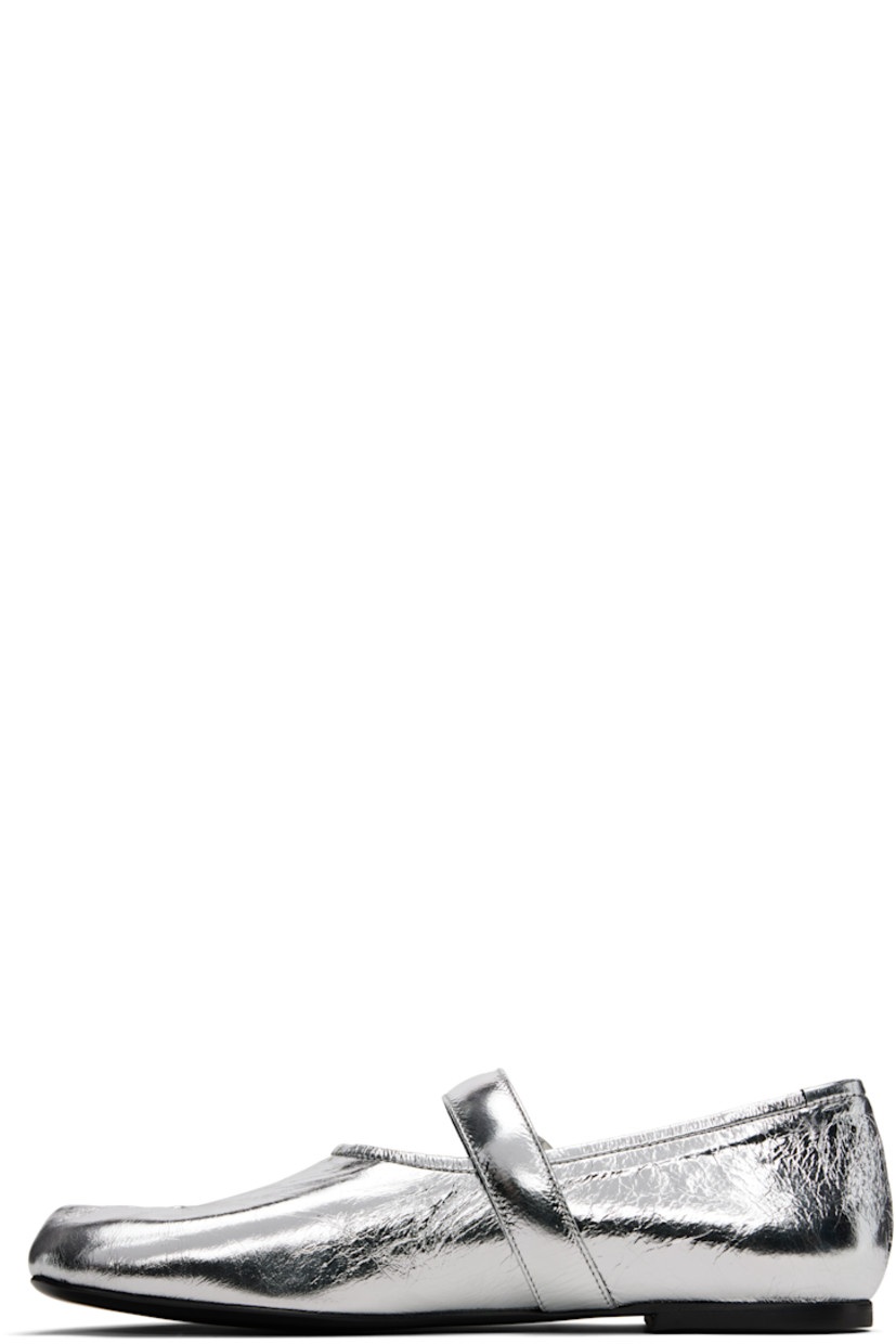 Crinkled leather Mary Jane-style loafers.

· Articulated toes
· Logo hardware at elasticized strap
· Buffed leather lining
· Rubber heel
· Leather sole

Supplier color: Silver