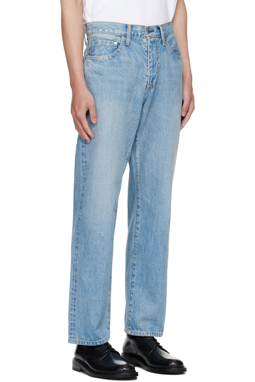 14 oz non-stretch selvedge denim jeans.

· Fading throughout
· Loose-fit and straight-leg
· Belt loops
· Five-pocket styling
· Zip fly
· Logo flag at coin pocket
· Logo patch at back waistband
· Contrast stitching in tan

Supplier color: Bleached capsule