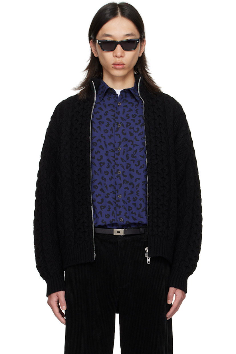 Cable-knit wool sweater.

· Rib-knit stand collar, hem, and cuffs
· Two-way zip closure
· Seam pockets at waist
· Dropped shoulders

Supplier color: Black