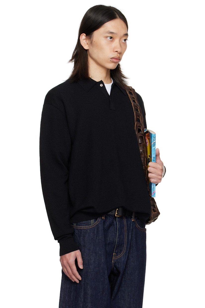 Knit wool polo.

· Rib-knit spread collar, hem, and cuffs
· Two-button placket
· Dropped shoulders

Supplier color: Black