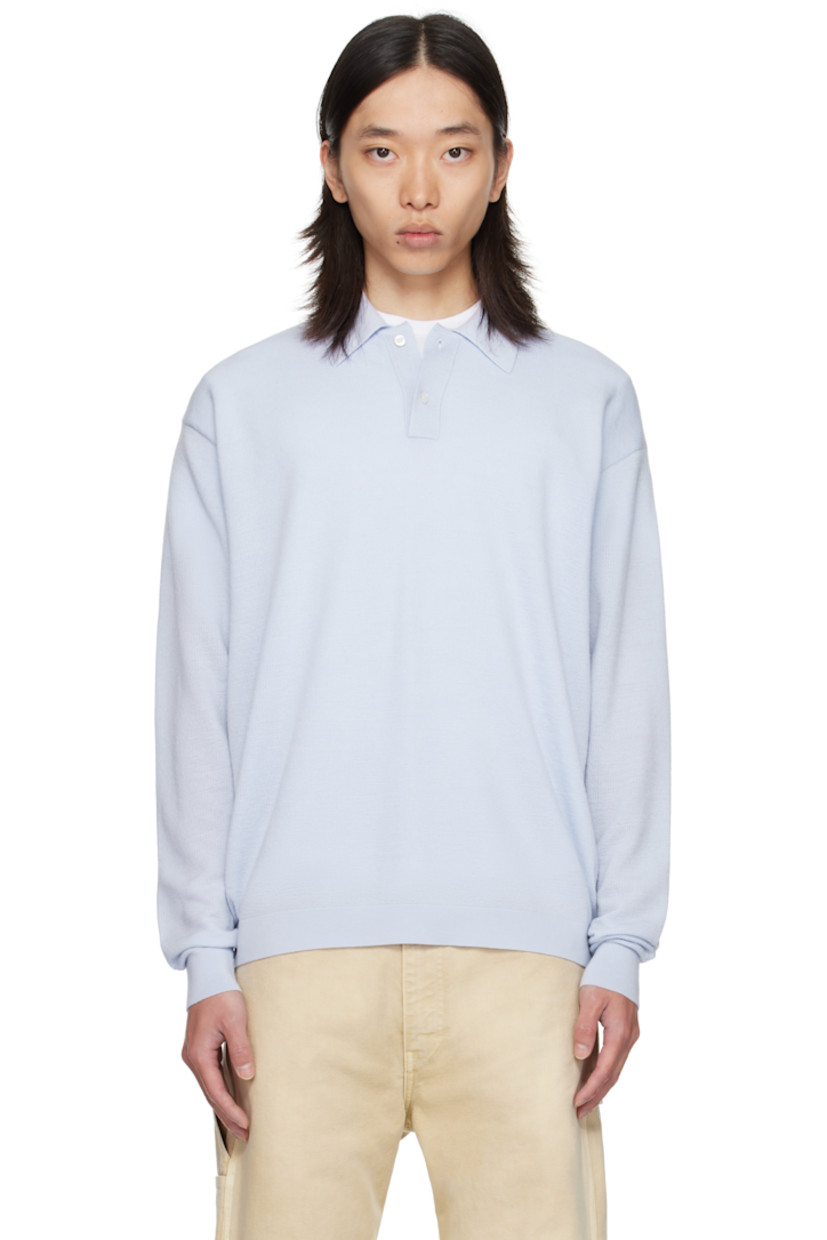 Knit wool polo.

· Rib-knit spread collar, hem, and cuffs
· Two-button placket
· Dropped shoulders

Supplier color: Ice blue