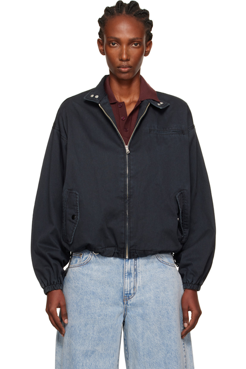 Cotton twill jacket.

· Subtle fading throughout
· Press-stud fastening and embroidered logo at stand collar
· Zip closure
· Welt pocket at chest
· Flap pockets at waist
· Bungee-style drawstring at hem
· Dropped shoulders
· Elasticized cuffs
· Full mesh lining

Supplier color: Navy