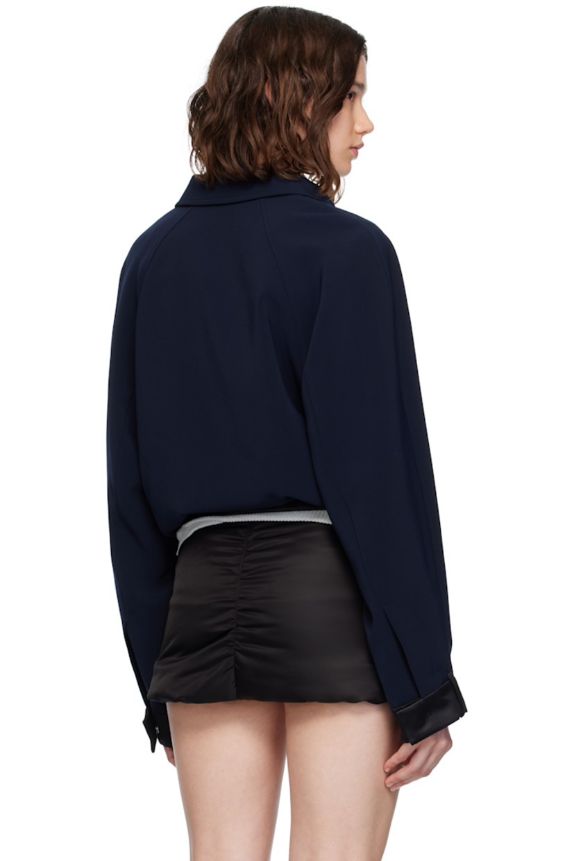 Plain-woven jacket.

· Spread collar
· Zip closure
· Logo embroidered at chest
· Welt pockets at front and interior
· Satin trim with belt loops and press-studs at hem and cuffs
· Twill lining
· Logo-engraved silver-tone hardware

Supplier color: Navy