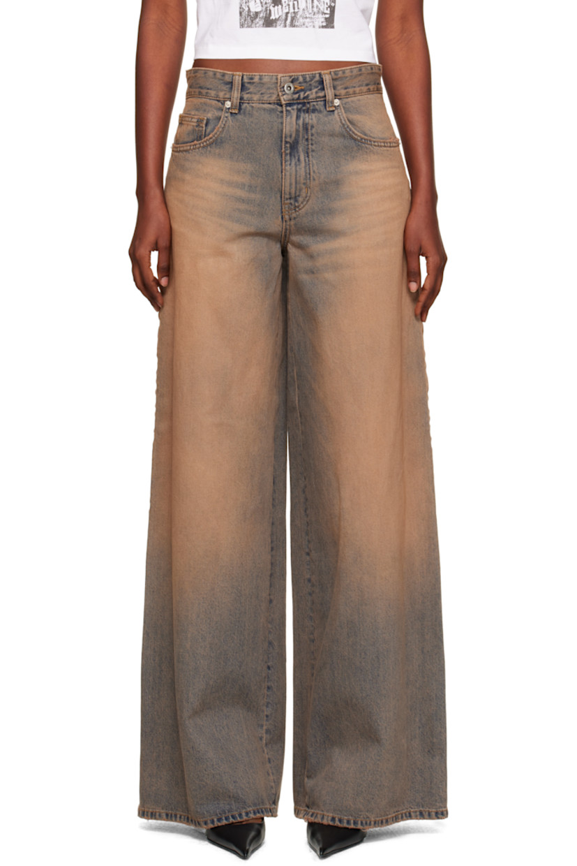 Non-stretch denim jeans.

· Discoloration, whiskering, and subtle distressing throughout
· Wide-leg
· Mid-rise
· Belt loops
· Five-pocket styling
· Zip fly
· Grosgrain trim at outseams
· Jacron logo patch at back waistband
· Logo embroidered at back pocket

Supplier color: Beige