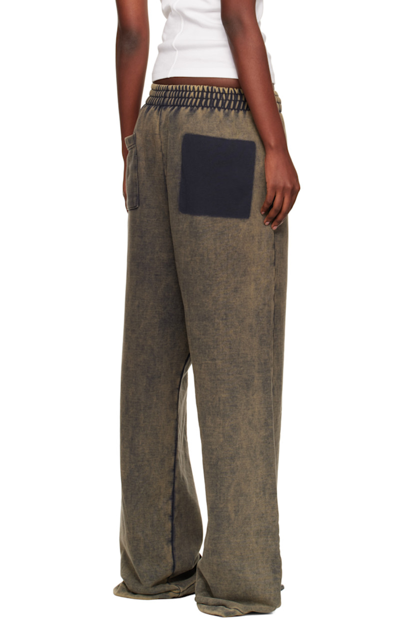 Cotton French terry sweatpants.

· Fading and discoloration throughout
· Concealed drawstring at elasticized waistband
· Three-pocket styling
· Mock fly
· Logo graphic patch at front

Supplier color: Charcoal