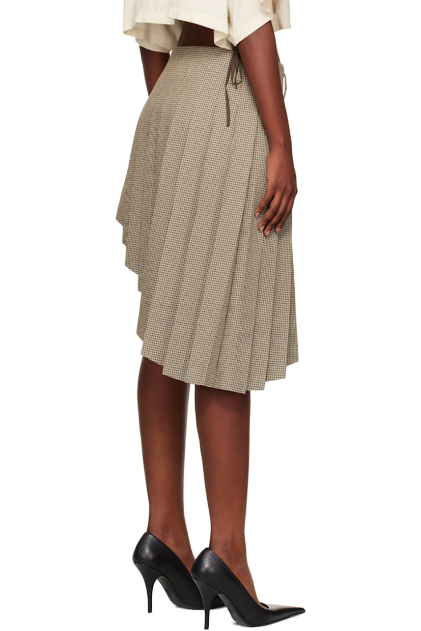 Wool-blend tweed midi skirt.

· Houndstooth pattern and knife pleats throughout
· Belt loops
· Asymmetrical hem
· Concealed zip closure at side seam
· Logo embroidered at back waist
· Unlined

Supplier color: Beige