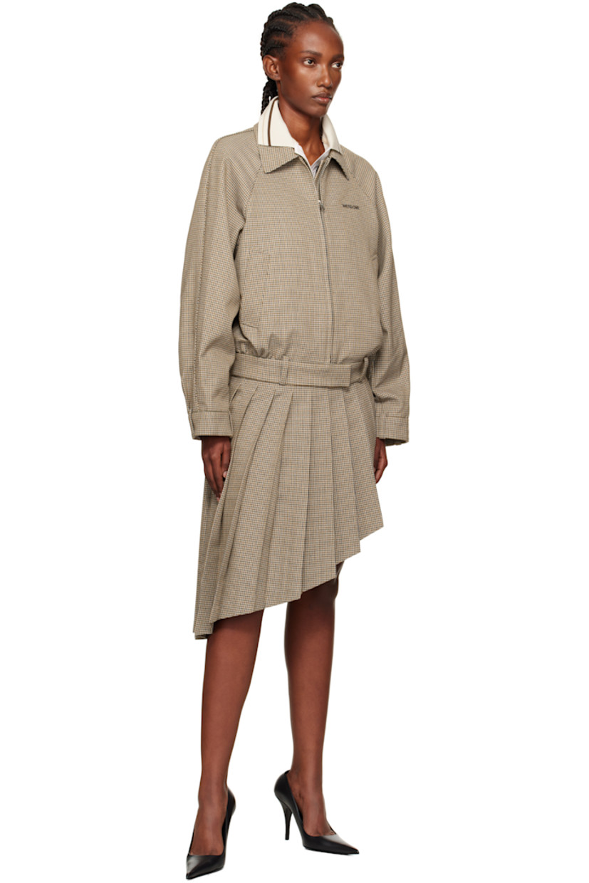 Wool-blend tweed midi skirt.

· Houndstooth pattern and knife pleats throughout
· Belt loops
· Asymmetrical hem
· Concealed zip closure at side seam
· Logo embroidered at back waist
· Unlined

Supplier color: Beige