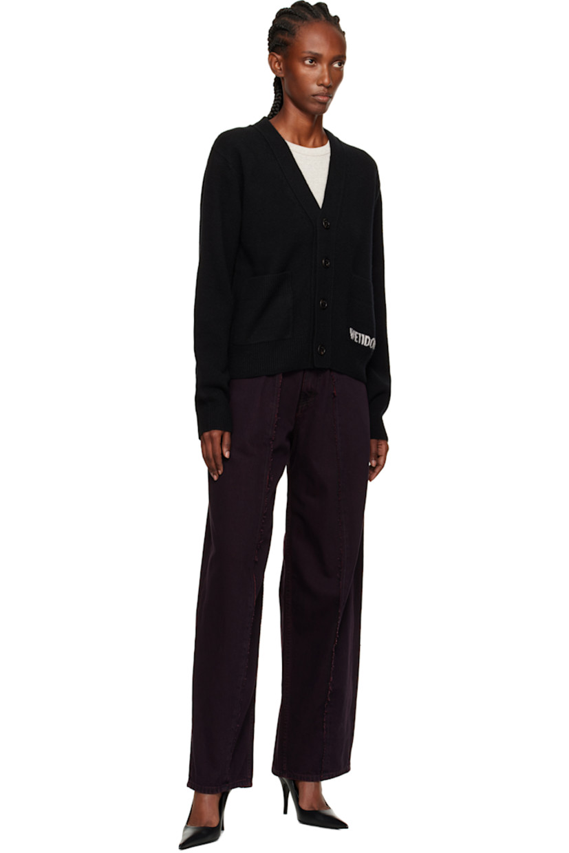 Brushed knit wool-blend cardigan.

· Rib-knit Y-neck, hem, and cuffs
· Button closure
· Patch pockets at waist
· Intarsia logo at pocket

Supplier color: Black