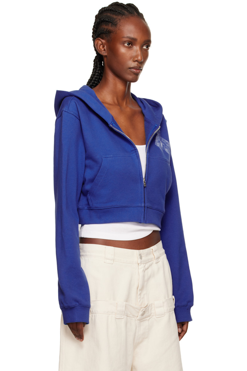 Cotton French terry hoodie.

· Zip closure
· Logo graphic printed at chest and back
· Patch pockets at front
· Cropped hem
· Rib-knit hem and cuffs

Supplier color: Blue
