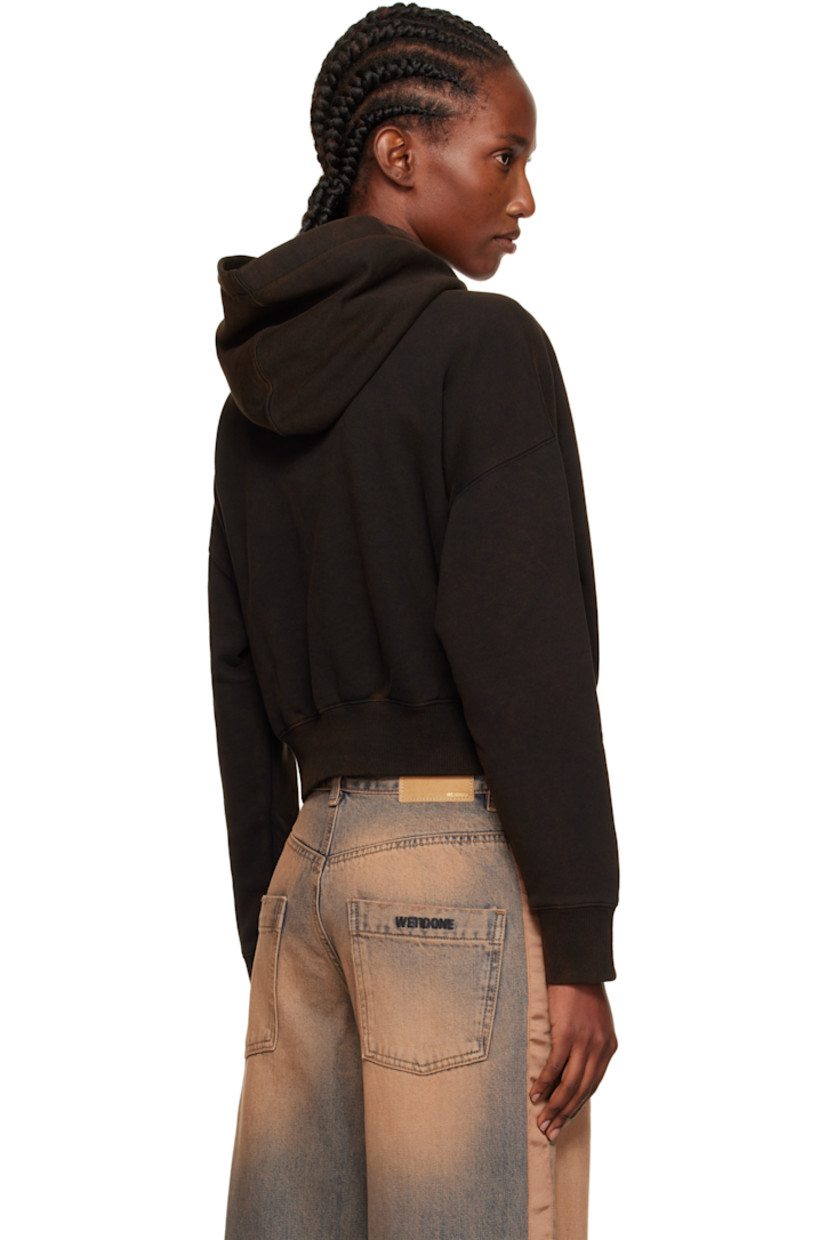 Cotton French terry hoodie.

· Discoloration throughout
· Logo embroidered at chest
· Kangaroo pocket at waist
· Rib-knit hem and cuffs
· Dropped shoulders

Supplier color: Black
