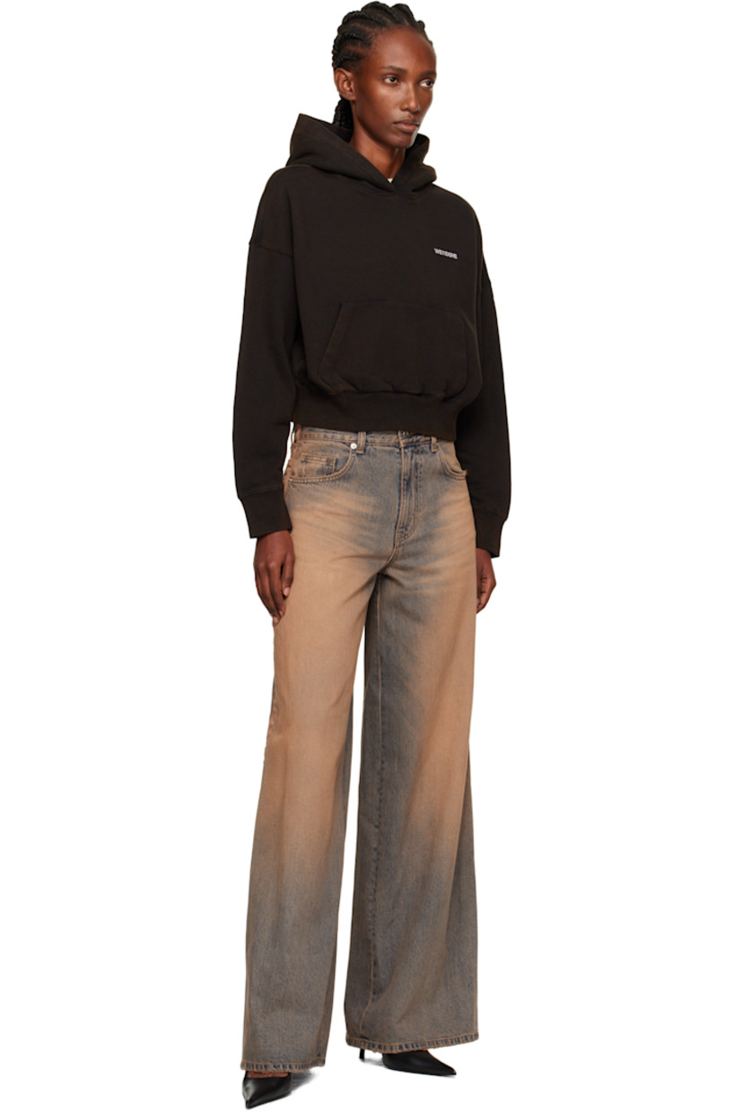 Cotton French terry hoodie.

· Discoloration throughout
· Logo embroidered at chest
· Kangaroo pocket at waist
· Rib-knit hem and cuffs
· Dropped shoulders

Supplier color: Black