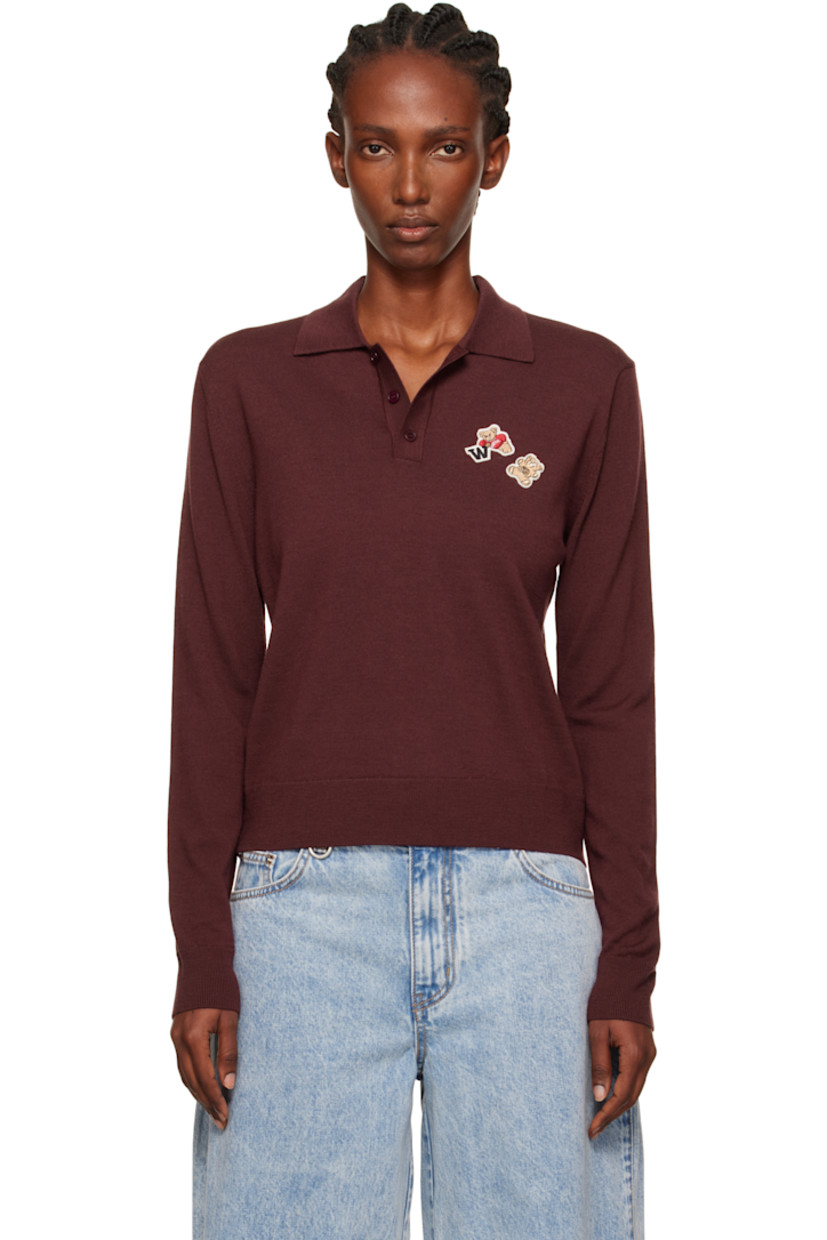 Knit wool polo.

· Rib-knit spread collar, hem, and cuffs
· Three-button placket
· Embroidered logo patches at chest

Supplier color: Wine