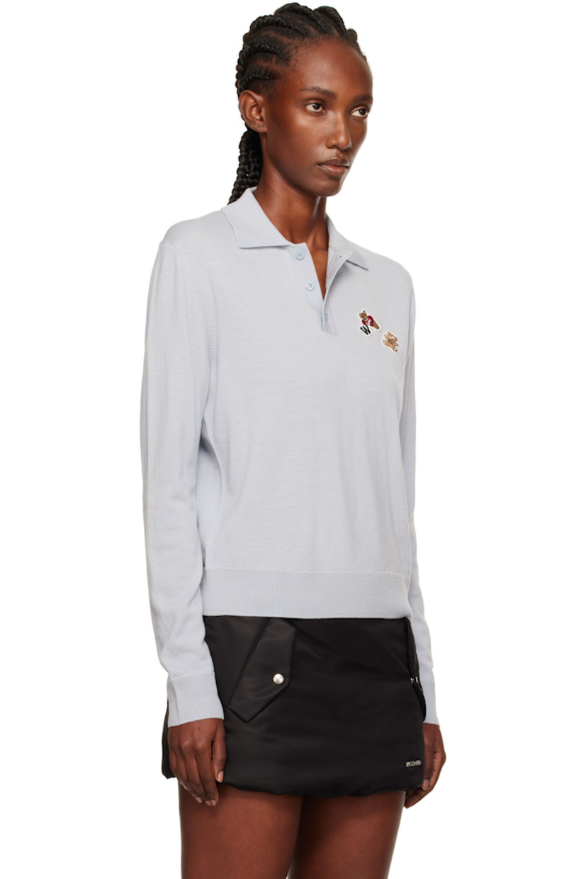 Knit wool polo.

· Rib-knit spread collar, hem, and cuffs
· Three-button placket
· Embroidered logo patches at chest

Supplier color: Grey