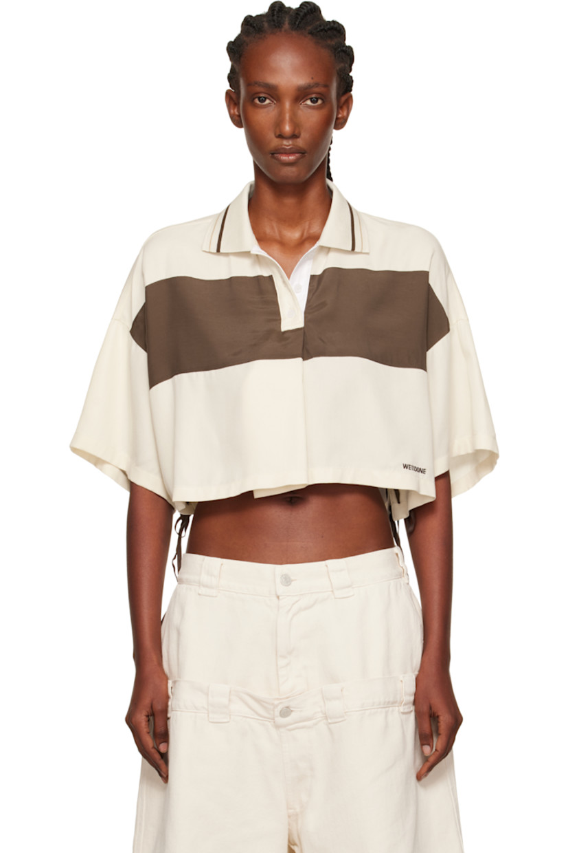 Rayon twill polo.

· Paneled construction
· Striped rib-knit spread collar
· Three-button placket 
· Pleat at front
· Logo embroidered at front hem
· Lace-up fastening at side seams
· Dropped shoulders

Supplier color: Ivory