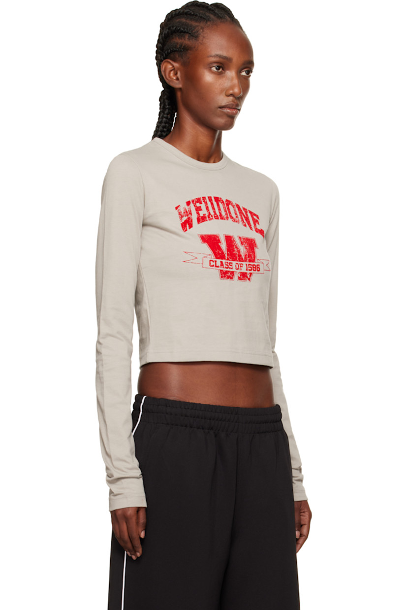 Cotton jersey T-shirt.

· Crewneck
· Logo graphic flocked at front
· Cropped hem
· Text flocked at back

Supplier color: Light grey