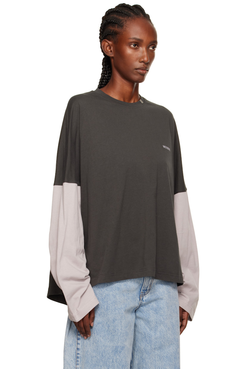 Cotton jersey T-shirt.

· Paneled construction
· Logo plaque at rib-knit crewneck
· Logo printed at chest
· Dropped shoulders
· Logo graphic printed at back hem

Supplier color: Grey