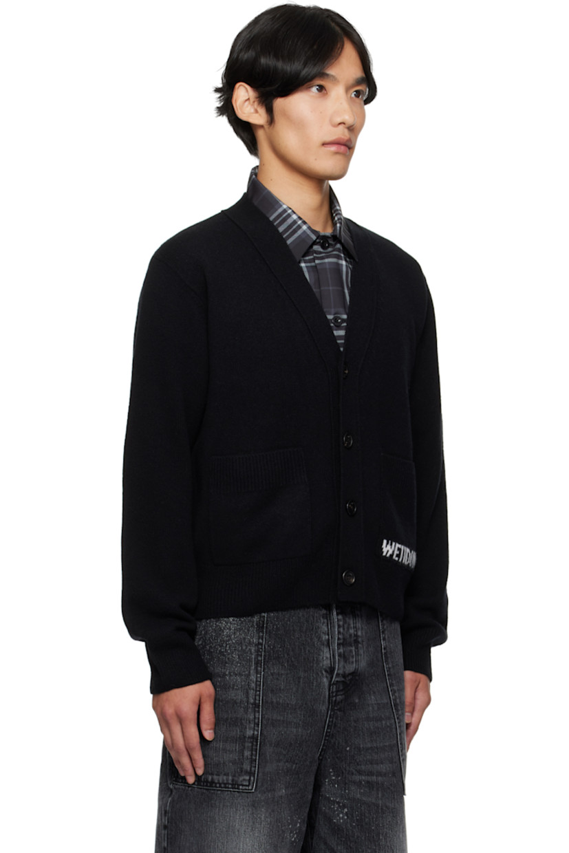 Knit wool-blend cardigan.

· Rib-knit Y-neck, hem, and cuffs
· Button closure
· Patch pockets and jacquard logo at front

Supplier color: Black