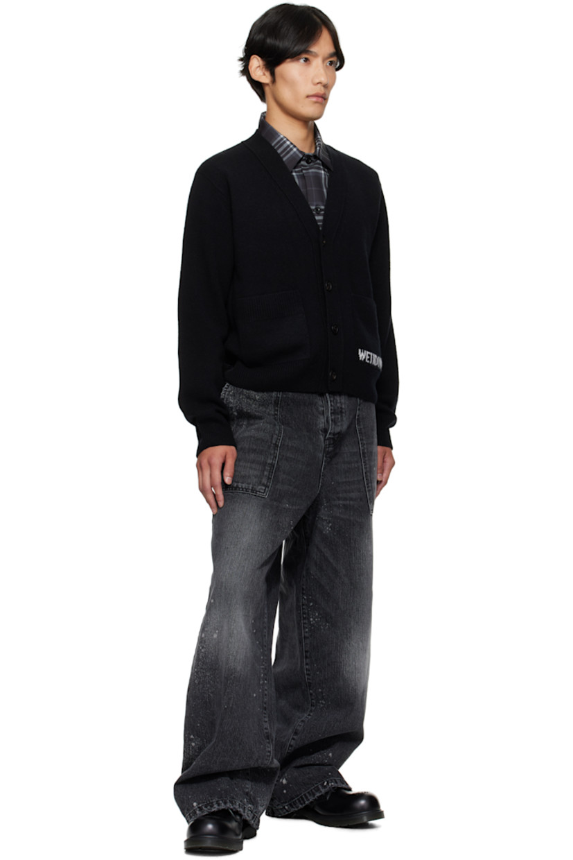 Knit wool-blend cardigan.

· Rib-knit Y-neck, hem, and cuffs
· Button closure
· Patch pockets and jacquard logo at front

Supplier color: Black