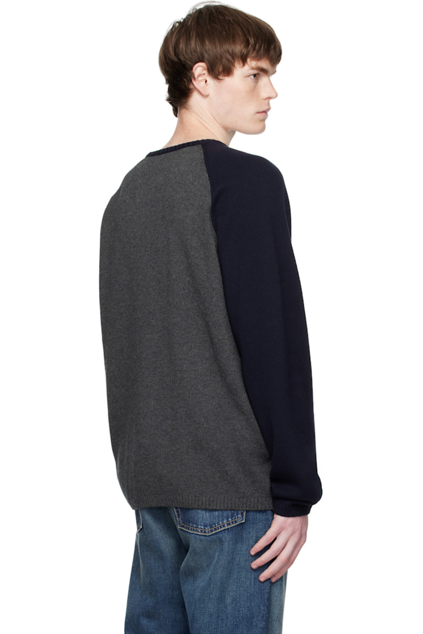 Knit wool- and cotton-blend sweater.

· Rib-knit crewneck, hem, and cuffs
· Logo graphic printed at front
· Raglan sleeves

Supplier color: Charcoal