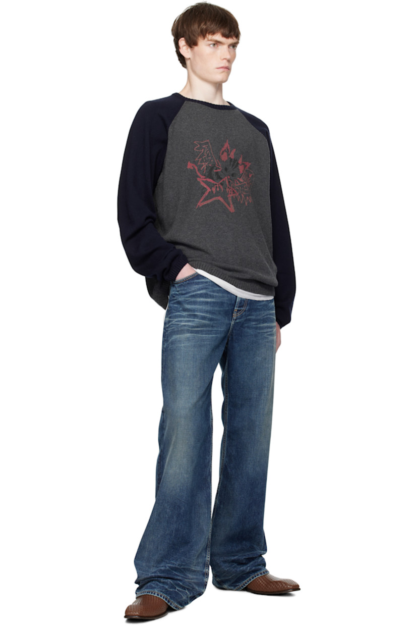 Knit wool- and cotton-blend sweater.

· Rib-knit crewneck, hem, and cuffs
· Logo graphic printed at front
· Raglan sleeves

Supplier color: Charcoal