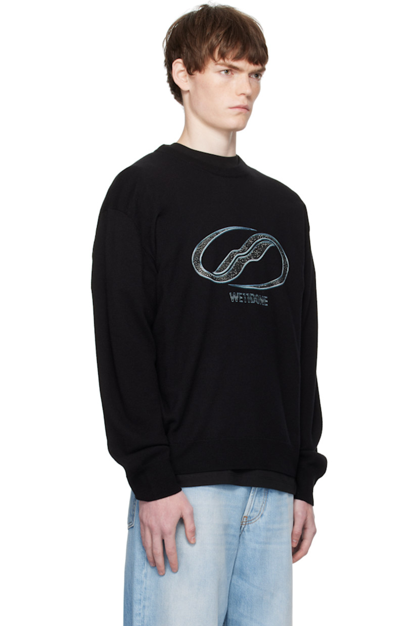 Knit wool sweater.

· Rib-knit crewneck, hem, and cuffs
· Printed logo with crystal-cut accents at chest
· Dropped shoulders

Supplier color: Black