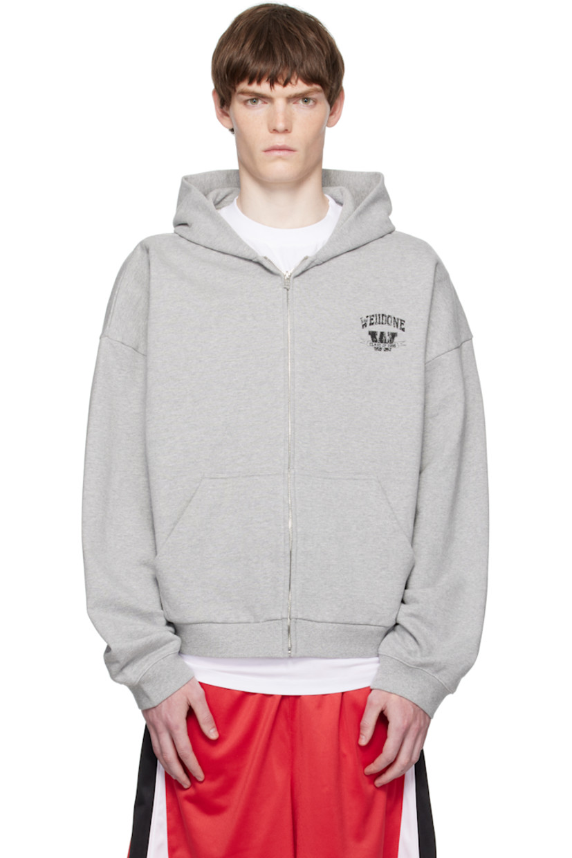Heavyweight cotton fleece hoodie.

· Zip closure
· Logo graphic printed at chest and back
· Patch pockets at waist
· Rib-knit hem and cuffs
· Dropped shoulders

Supplier color: Melange Grey